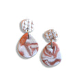 Earth marbled earrings with textured studs
