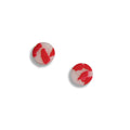 Red and white abstract stud earrings