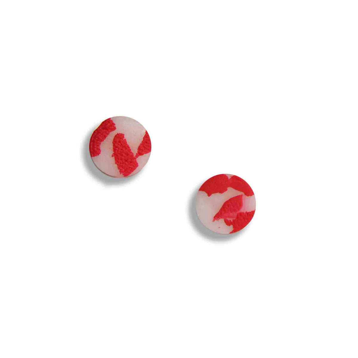 Red and white abstract stud earrings